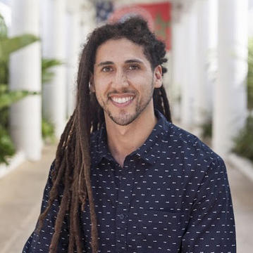 Harvard student, Collin Cherubim, smiling.