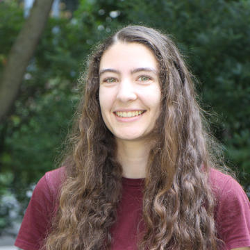maya waarts smiling.