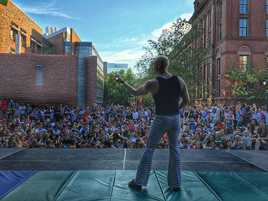 Performer in front of crowd