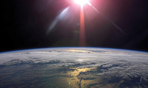 Solar Flare and the Earth pictured from space.